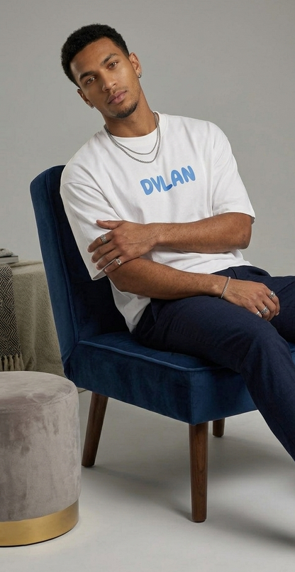 Front view of a white T-shirt featuring a circular clock with Roman numerals, two koi fish inside the clock, and the text “Only dead fish go with the flow.”