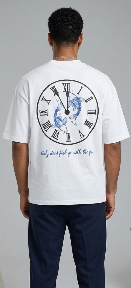 A man viewed from behind wearing a white t-shirt with a large graphic print on the back. The graphic features a clock face with Roman numerals, two blue fish, and the text 'Only dead fish go with the fe'.
